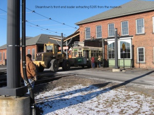 5205 being moved from the Electric City Trolley Museum Building
